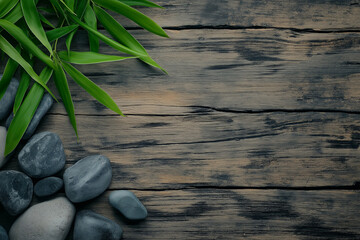 Wellness Backdrop with Bamboo Leaves and Smooth Black Stones