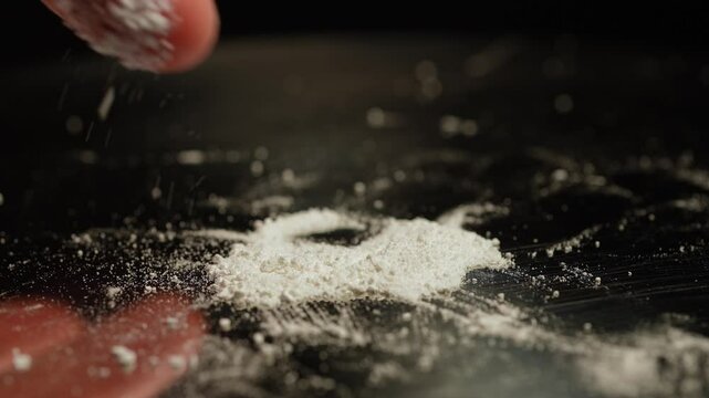 Person planning to get high with illegal dangerous street opioid Fentanyl drugs, white powder crystalline. Widespread misuse of prescription drugs. Illegal drug markets and Over prescription addiction