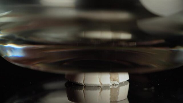 Person preparing illegal street drugs like white crystalline powder for consumption by snorting. Opioid epidemic is a major public health crisis leading to addiction, overdoses, and deaths.