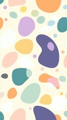 Fototapeta premium Pastel-colored irregular shapes are scattered across a light yellow background, creating a playful and abstract pattern that evokes a sense of fun and creativity