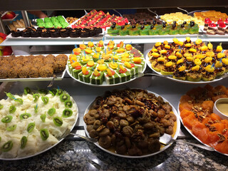 Large assortment of Turkish sweets. Turkish sweets on the counter in the store.