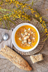 bowl of homemade pumpkin cream with bread