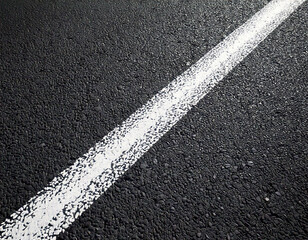 Fototapeta premium White painted line on city asphalt road. 