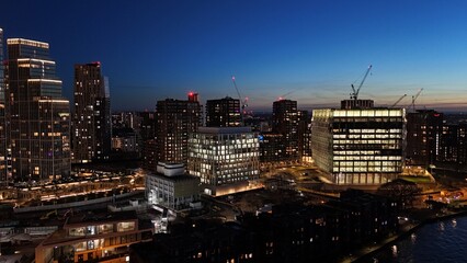 Obraz premium Lights of London US Embassy at dusk , sunset drone,aerial.