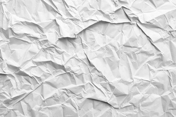 Obraz premium Crumpled white paper provides a textured background, suitable for various design and artistic applications, conveying a sense of imperfection or casualness