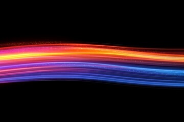 Vibrant light trails create a mesmerizing wave of color against a dark background