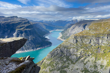 Embark on an unforgettable hike to Trolltunga, Norway's iconic cliff, where adventure meets nature in the heart of the Hardangerfjord region. 
