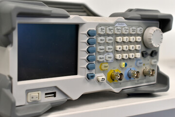 An electronic oscilloscope in the laboratory. A device for measuring voltage.