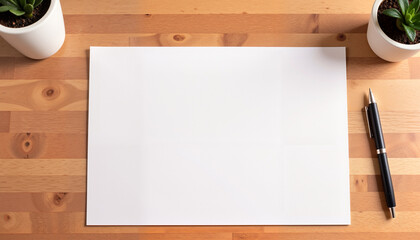 Minimalist desk setup with blank paper and pen, creative inspiration