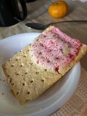 Morning pastry in dish on breakfast table