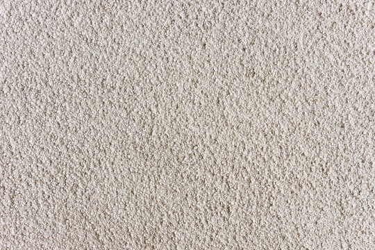 White Painted Rough Pebble Dash Cement Wall Texture