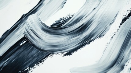 Abstract monochrome paint strokes creating texture on white background with Copy Space for text placement