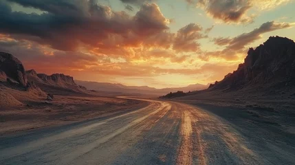Fototapete Rund Desert landscape at sunset with winding road and dramatic clouds in the sky Copy Space © ArtificialHorizons