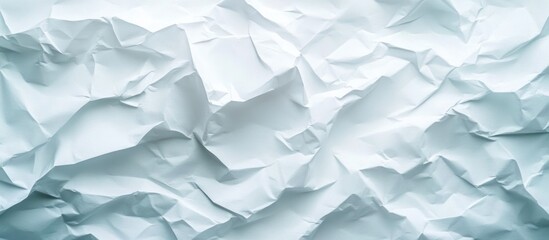 Fototapeta premium Crumpled white paper texture background with visible creases and folds Copy Space