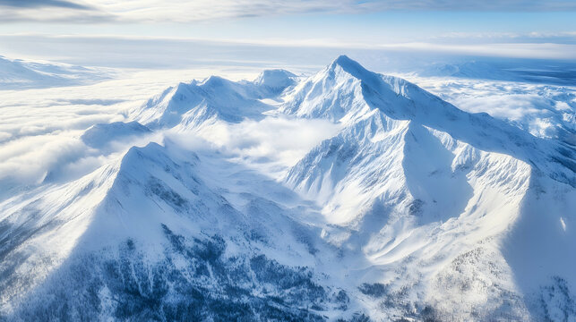 Breathtaking aerial view of snow-covered Ural Mountains, showcasing serene winter landscape with dense forests and majestic peaks, evoking peace and wonder