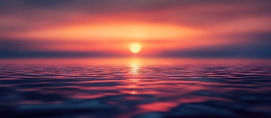 Obraz premium Pastel sunset over calm water with bokeh effect creating a serene background ideal for text overlay and design projects.