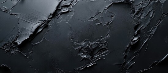 Obraz premium Black Slate Texture Background with Chalkboard Effect Ideal for Copyspace and Text Overlay in Modern Designs