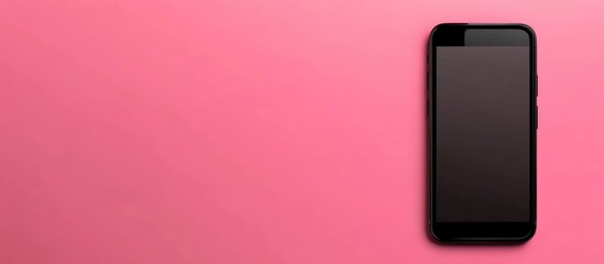 Black smartphone isolated on pink background with ample copyspace for customizable text or graphic elements to enhance visual appeal