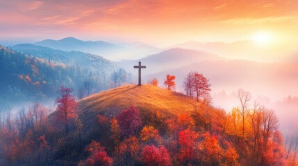 Autumn landscape with a cross on a hilltop surrounded by colorful trees and misty mountains at sunrise Copy Space