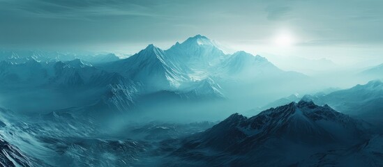 Misty blue mountain landscape with sun rising in the background and Copy Space for text placement