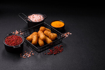 Delicious crispy cheese sticks with mozzarella, salt and spices