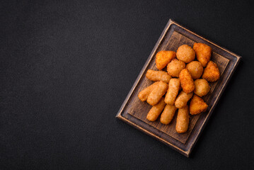 Delicious crispy cheese sticks with mozzarella, salt and spices