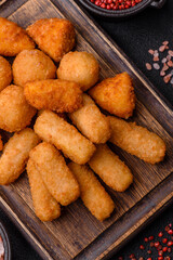 Delicious crispy cheese sticks with mozzarella, salt and spices