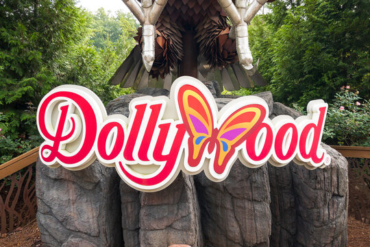 Pigeon Forge, TN, USA - August 5, 2022: A Dollywood amusement park logo. Dollywood is Dolly Parton's famous amusement park located in the Smoky Mountains.