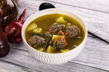Soup with beef meatballs and vegetables