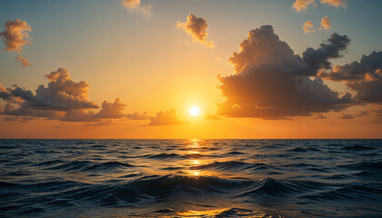 Obraz premium Golden sunset over a calm ocean