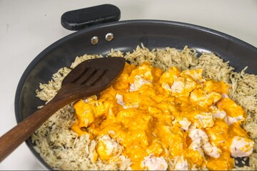 frying pan with meat and vegetables