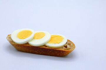 Small sandwich with boiled egg. Healthy and fast food.