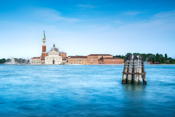Venice, San Giorgio Maggiore church and a briccola. Italy. Long exposure