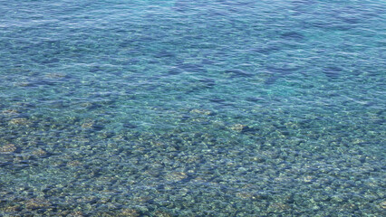 Soft turquoise wave on the coast, Sardinia, Italy