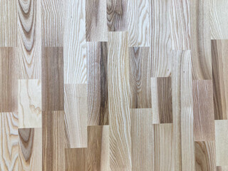 Close-up image of a wooden texture, showcasing vertical and horizontal patterns Soft shadows enhance depth perception in this artistic photograph No distinguishable elements besides textures and pa