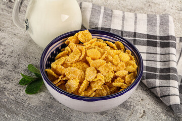 Corn flakes with milk for breakfast