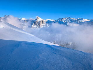 Fototapeta premium Ski slopes and mountains, Melchsee-Frutt mountain resort village, Switzerland