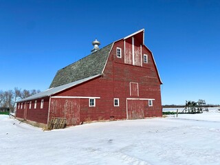 A quintessential midwestern livestock barn in snow