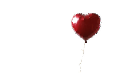 A heart-shaped balloon drifting in the air, isolated on white background in HD