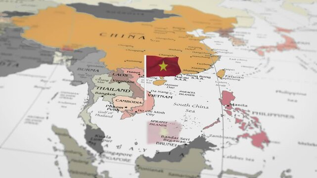 The camera rotating around  vietnam, on the world map takes the focus. The vietnam flag is waving. vietnam flag waving on the map 4K Animation.