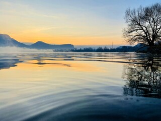 sunrise on the lake with orange and blue shades 