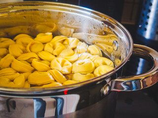 Cooking fresh tortellini in a stainless steel pot