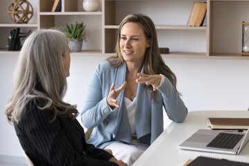 Businesswoman provide information, share idea or approach to colleague, manager and client lead...