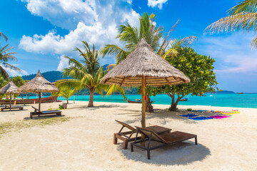 Parasol, sunbed on beach