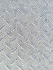 Metal diamond plate texture background. Close up of metal diamond plate texture.