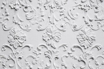 A detailed white decorative relief featuring scrolling leaves and flowers. Ideal for classical architecture, refined interiors, and luxury decorative design concepts.

