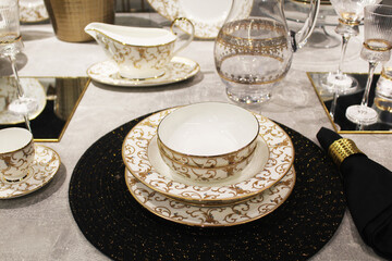beautiful table setting, empty beautiful ceramic plates on the table
