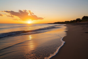 Obraz premium Golden Sunset Over a Serene Beach with Gentle Waves Reflecting Warm Light - Concept of Tranquility, Nature, and Relaxation