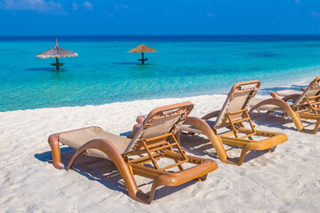 Sun bed and parasol at tropical beach