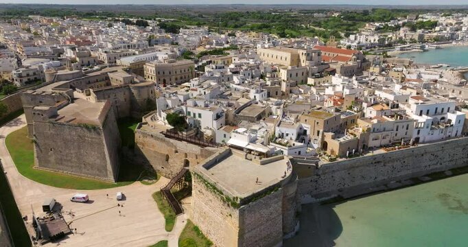 Aragonese Castle Of Otranto At Piazza Castello In Otranto, Apulia, Italy. aerial orbiting shot